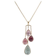 18K Yellow Gold Chain with a Pendant Set with Four Tourmalines Cabochons