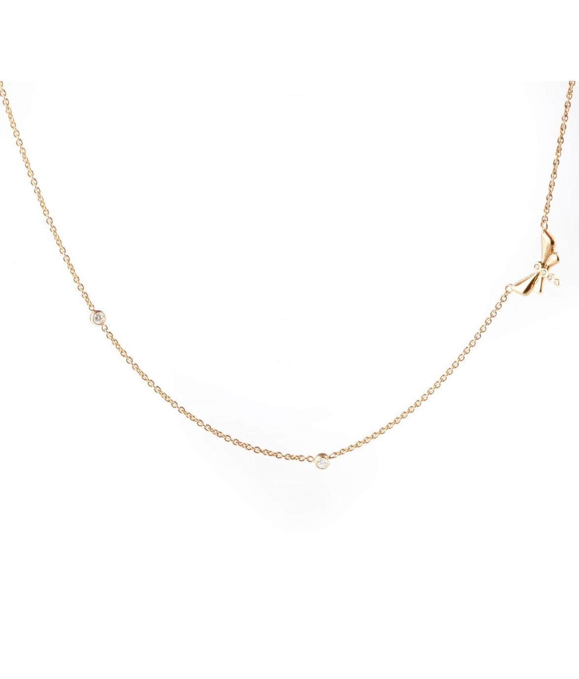 Hand made in 9 karat yellow gold this dainty little necklace has 2 diamonds: one to the centre and one to the side as well as making up the body of the Dragonfly which weigh at approximately .20 carats all together. Part of our Princess Collection,