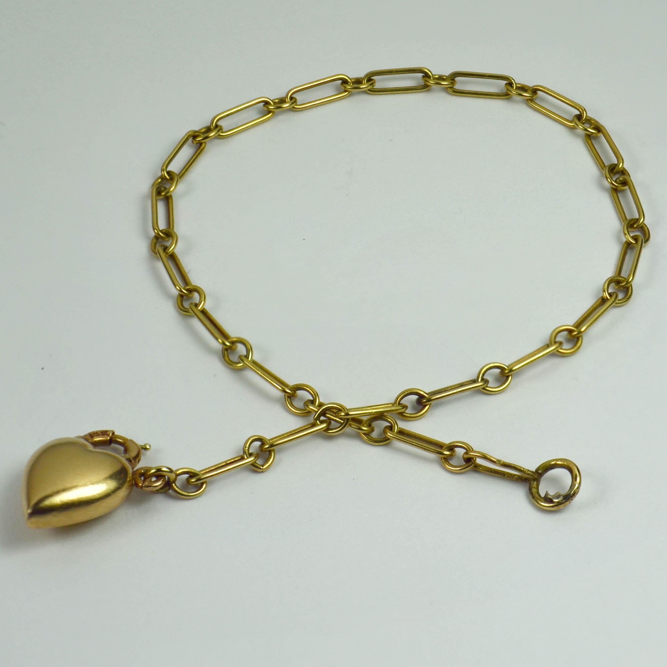 Yellow Gold Chain Link Bracelet with Puffy Heart Padlock Charm Pendant In Good Condition For Sale In London, GB