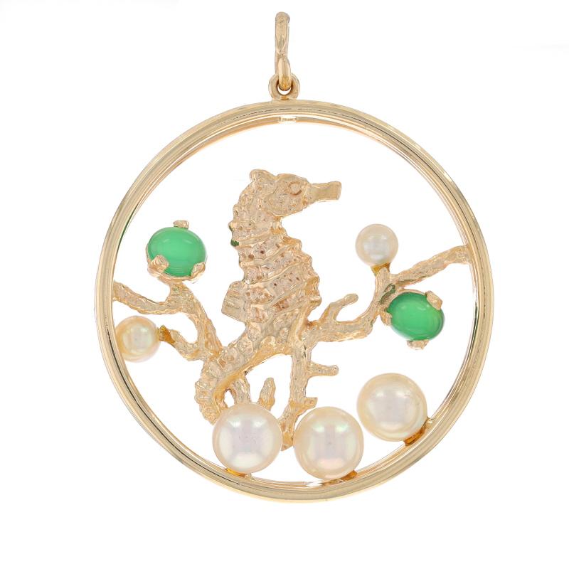 Metal Content: 14k Yellow Gold

Stone Information
Natural Chalcedony
Cut: Oval Cabochon
Color: Green

Cultured Pearls
Color: Cream
Size: 4.3mm - 7.1mm

Theme: Seahorse, Ocean Life

Measurements
Tall (from stationary bail): 1 11/16