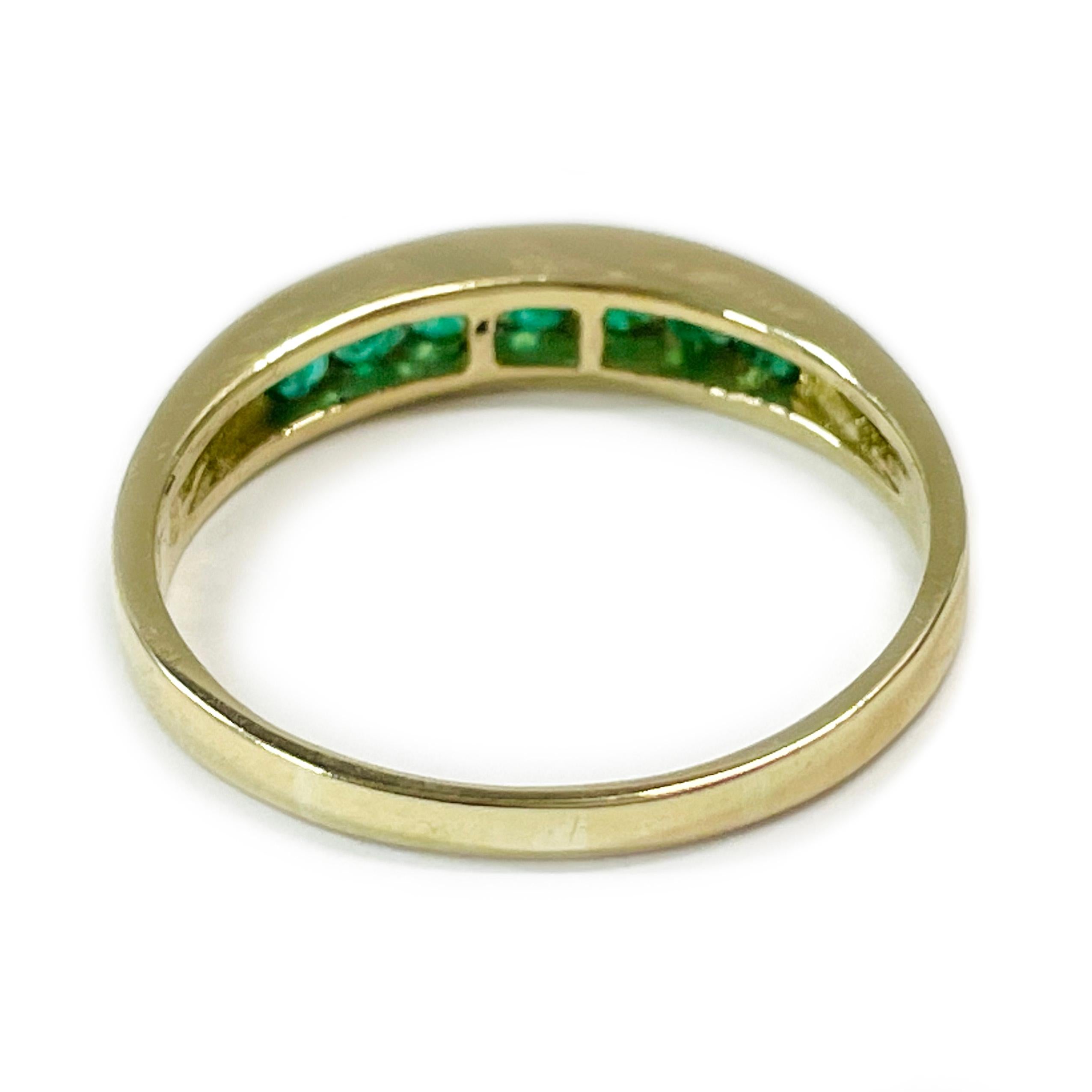 channel set emerald ring