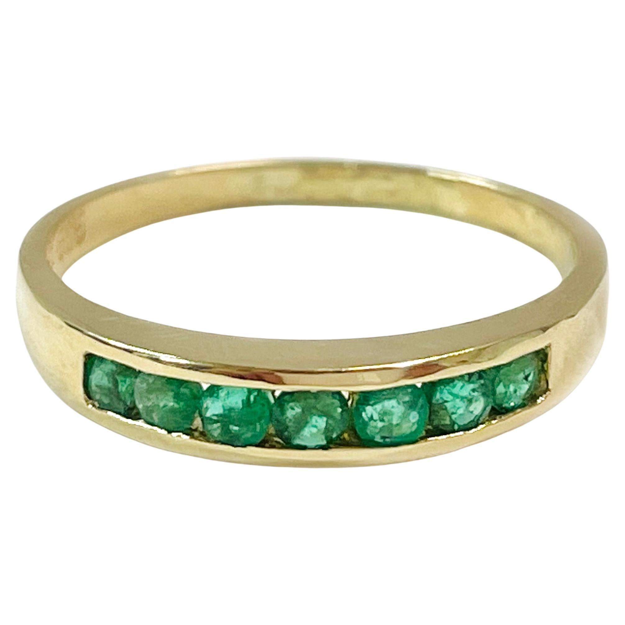 Yellow Gold Channel-Set Emerald Ring For Sale