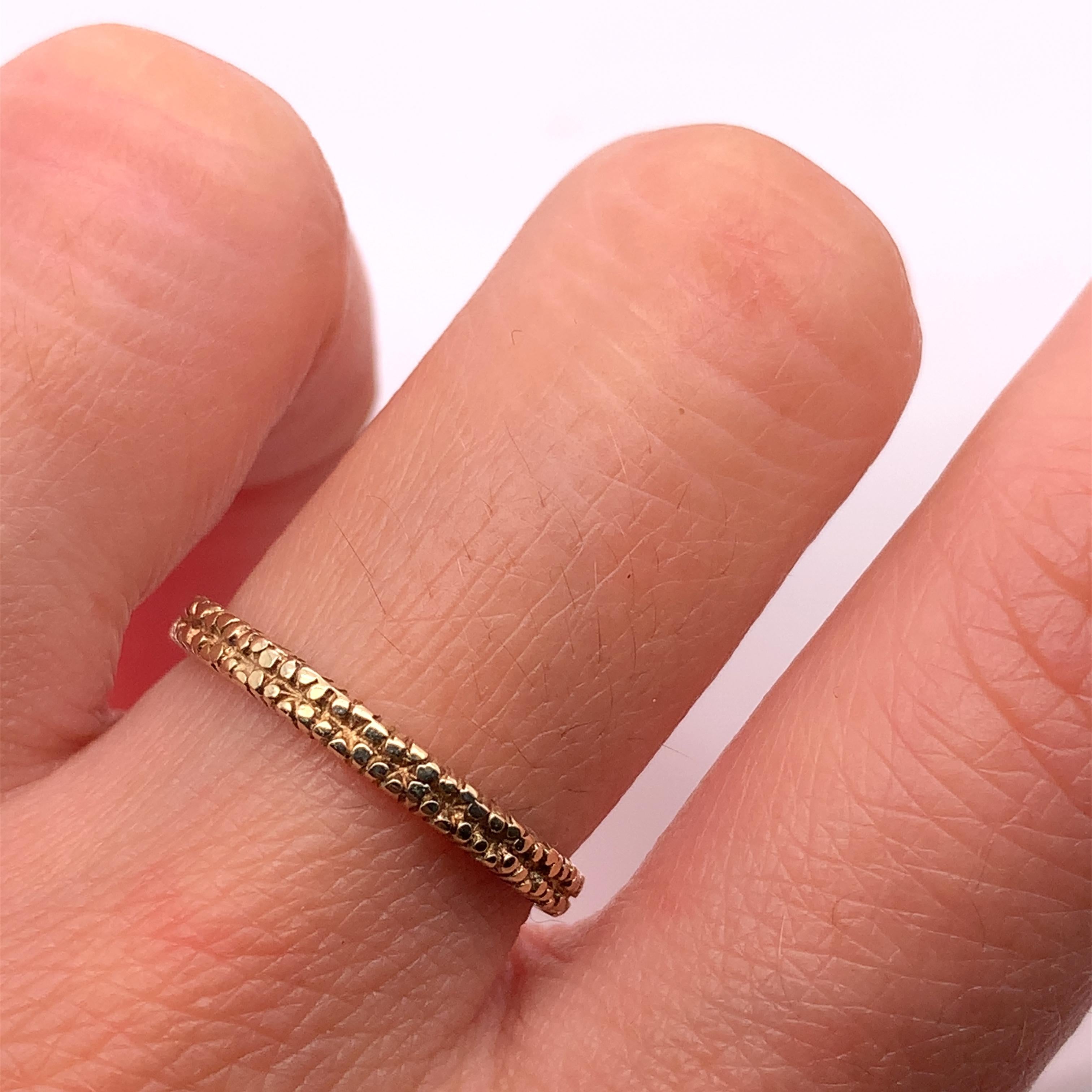 This exquisite 9ct yellow gold chunky stackable twist engagement ring is a perfect choice for your special day. Crafted from natural gold, this ring is not enhanced and features a brilliant cut with excellent cut grade. The ring size is L and has a