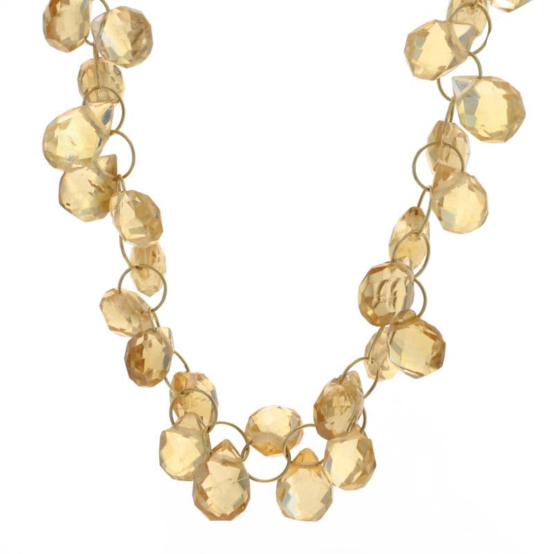 Metal Content: 18k Yellow Gold

Stone Information

Natural Citrine
Treatment: Heating
Cut: Briolette

Chain Style: Cable
Necklace Style: Beaded Chain
Fastening Type: J-Hook with Side Safety Clasp

Measurements

Length: 16 1/2