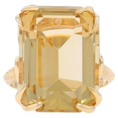 Bague cocktail solitaire en or jaune 14 carats taille émeraude 21,40 carats