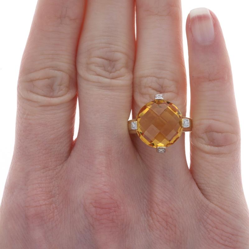 Size: 7 1/4
Sizing Fee: Up 1 size for $50 or Down 1 size for $50

Metal Content: 18k Yellow Gold & 18k White Gold

Stone Information

Natural Citrine
Treatment: Heating
Carat(s): 6.10ct
Cut: Double Checkerboard Round
Color: Yellow

Natural