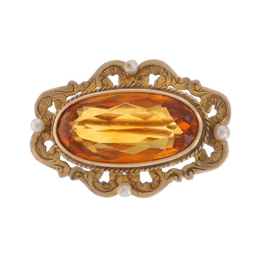 Era: Edwardian
Date: 1900s - 1910s

Metal Content: 14k Yellow Gold

Stone Information

Natural Citrine
Carat(s): 6.87ct
Cut: Oval
Color: Orange

Natural Pearls

Total Carats: 6.87ct

Style: Brooch
Fastening Type: Hinged Pin and Locking