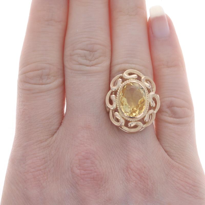 Size: 5 1/4
Sizing Fee: Up 2 sizes for $45 or Down 1 size for $45

Era: Retro
Date: 1940s - 1950s

Metal Content: 14k Yellow Gold

Stone Information

Natural Citrine
Treatment: Heating
Carat(s): 5.20ct
Cut: Oval
Color: Yellow

Total Carats: