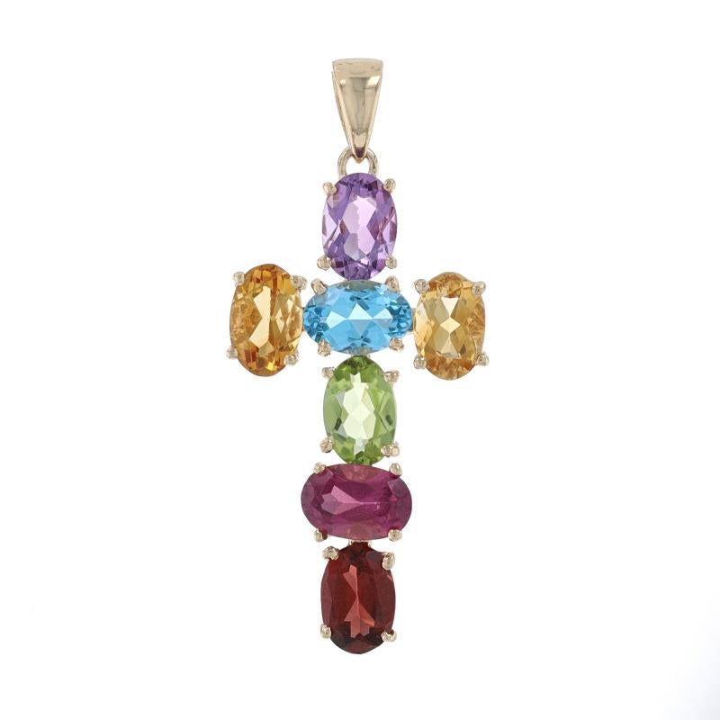 Metal Content: 14k Yellow Gold

Stone Information
Natural Citrines
Treatment: Heating
Carat(s): .90ctw
Cut: Oval
Color: Yellow

Natural Blue Topaz
Treatment: Routinely Enhanced
Carat(s): .57ct
Cut: Oval

Natural Rhodolite Garnet
Carat(s): .55ct
Cut: