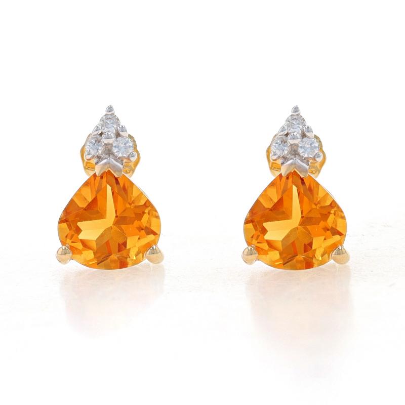 Metal Content: 10k Yellow Gold & 10k White Gold

Stone Information
Natural Citrines
Treatment: Heating
Carat(s): 2.56ctw
Cut: Pear
Color: Orange

Natural Topaz
Carat(s): .18ctw
Cut: Round
Color: White

Total Carats: 2.74ctw

Style: Stud
Fastening