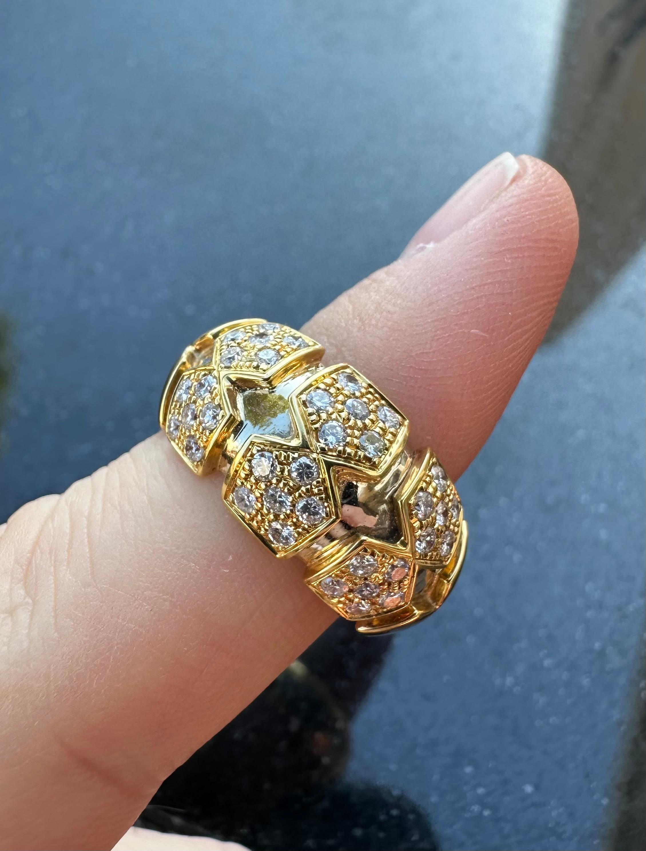 Yellow Gold Cocktail Ring set with 36 White Diamonds weighing 0,59 ct.
Weight in 19.2K Gold: 9.4 g.
Handmade in Portugal.
Stamped by the portuguese assay office as 19.2K Gold.
Stamped with Rosior hallmark.
Loyal to artisanal techniques, Rosior