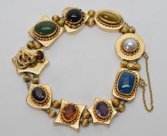 Vintage Multi Gemstone 14 Karat Yellow Gold Charm Bracelet