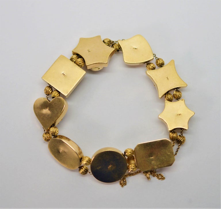 Vintage Multi Gemstone 14 Karat Yellow Gold Charm Bracelet at 1stDibs
