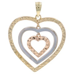Yellow Gold Concentric Hearts Pendant - 10k Love
