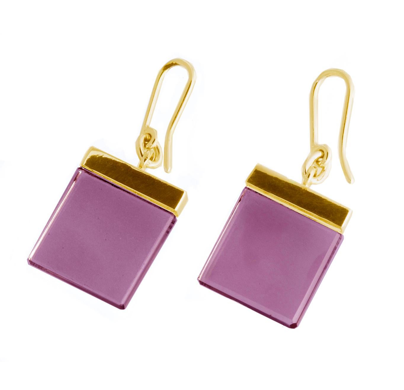 The earrings are made of 14 karat yellow gold and feature 15x15x3 mm natural amethysts that are both attractive and elegant. The gems may look more light pink than purple in this cut.

This contemporary jewellery collection was originally designed