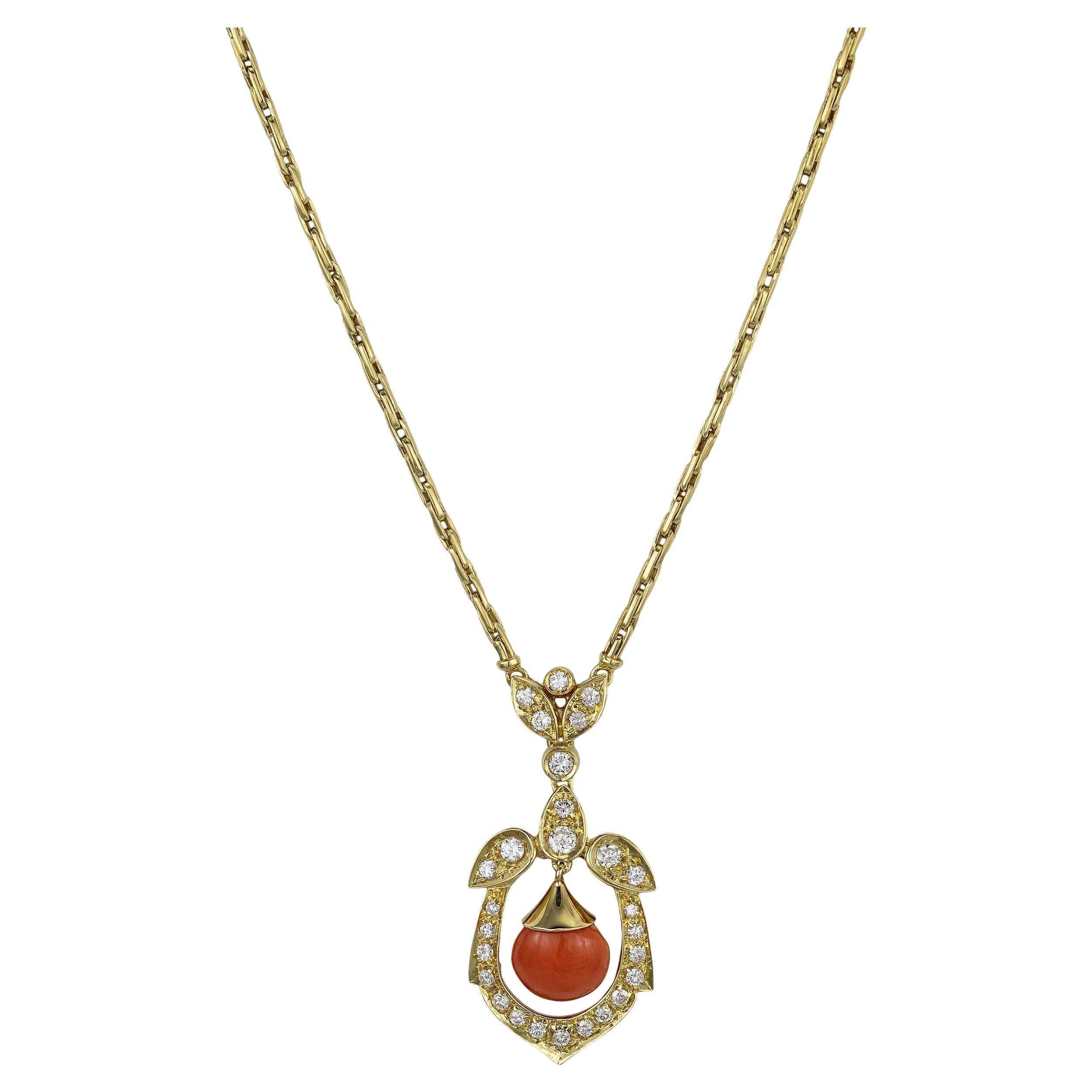 Collier pampille en or jaune, corail et diamant