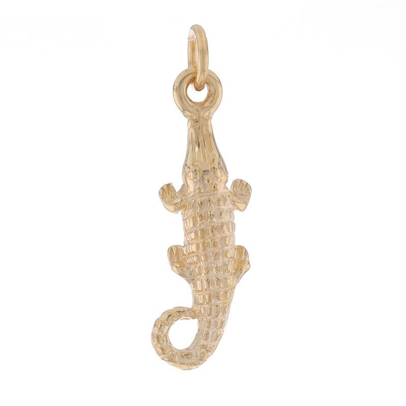 Metal Content: 14k Yellow Gold

Theme: Crocodile, Reptile
Features: Textured Detailing

Measurements

Tall (from stationary bail): 7/8
