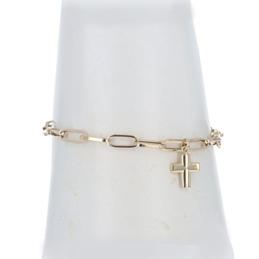 Metal Content: 14k Yellow Gold

Chain Style: Paperclip
Bracelet Style: Chain
Fastening Type: Lobster Claw Clasp
Theme: Cross, Faith
Features: Hollow construction for comfortable, all-day wear

Measurements

Item 1: Bracelet
Length: 7
