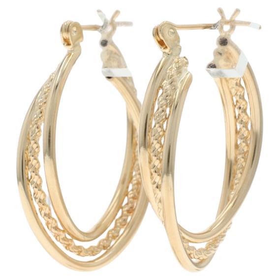 Boucles d'oreilles croisées en or jaune 14k Chaîne en corde percée