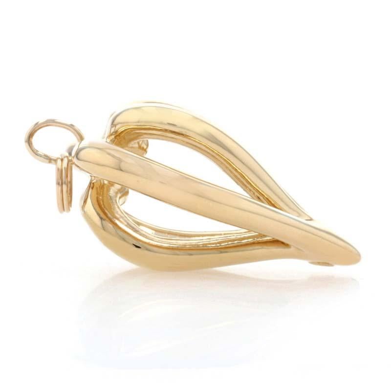 Brand: Carla

Metal Content: 14k Yellow Gold

Theme: Crown Heart, Love 
Features: Open Cut Design with Hollow Construction for Comfortable Wear

Measurements
Tall (from stationary bail): 1 1/2