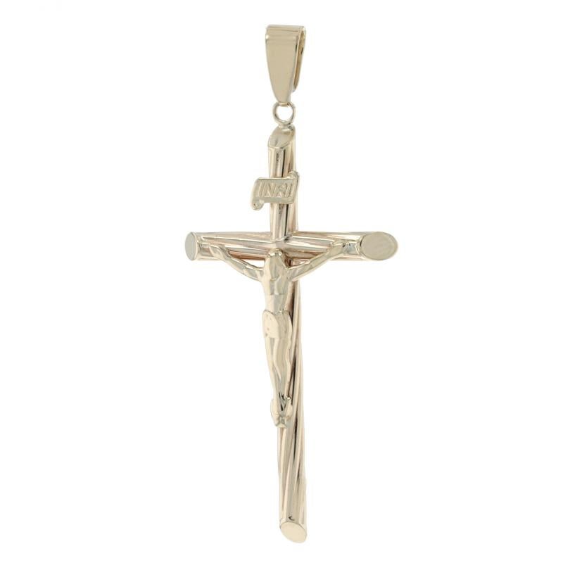 Metal Content: 10k

Theme: Crucifix, Cross, Faith
Features:  Hollow Construction with Smooth & textured finishes

Measurements
Tall (from stationary bail): 1 27/32