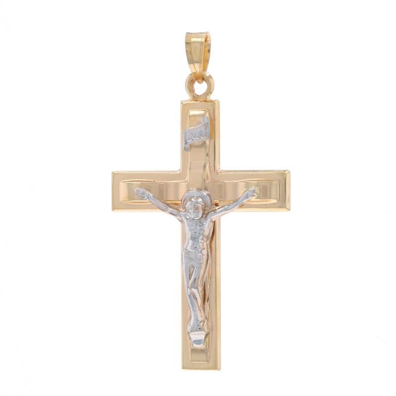Metal Content: 14k Yellow Gold & 14k White Gold

Theme: Crucifix, Cross, Faith

Measurements

Tall (from stationary bail): 1 5/16