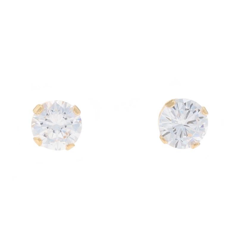 Metal Content: 14k Yellow Gold

Stone Information

Cubic Zirconia
Carat(s): 1.00ctw DEW
Cut: Round Brilliant

Total Carats: 1.00ctw

Style: Stud
Fastening Type: Butterfly Closures

Measurements

Tall: 7/32