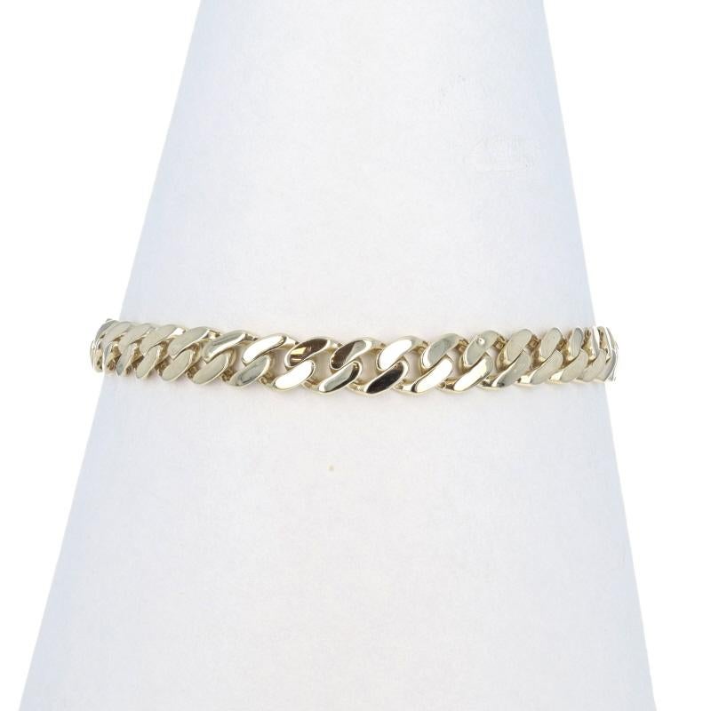 Metal Content: 14k Yellow Gold

Stone Information

Cubic Zirconias
Carat(s): .25ctw DEW
Cut: Round Brilliant

Total Carats: .25ctw

Chain Style: Curb
Bracelet Style: Chain
Fastening Type: Double Tab Box Pusher Clasp
Features: CZ Accented