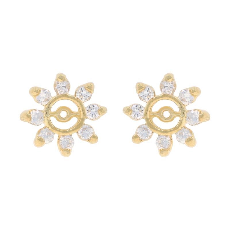 Metal Content: 14k Yellow Gold

Stone Information

Cubic Zirconias
Carat(s): .80ctw DEW
Cut: Round Brilliant

Total Carats: .80ctw dew

Style: Halo Earring Enhancer Stud Jackets
Theme: Floral

Measurements

Tall: 15/32