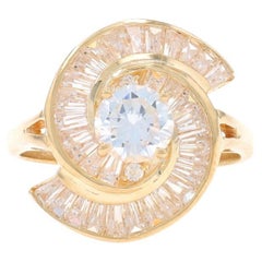 Anello a spirale in oro giallo con zirconi tondi e baguette da 3,00 carati 14k