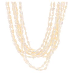 Neunstrangige Halskette aus Gelbgold mit Zucht-Süßwasserperlen 17 1/4" - 14k