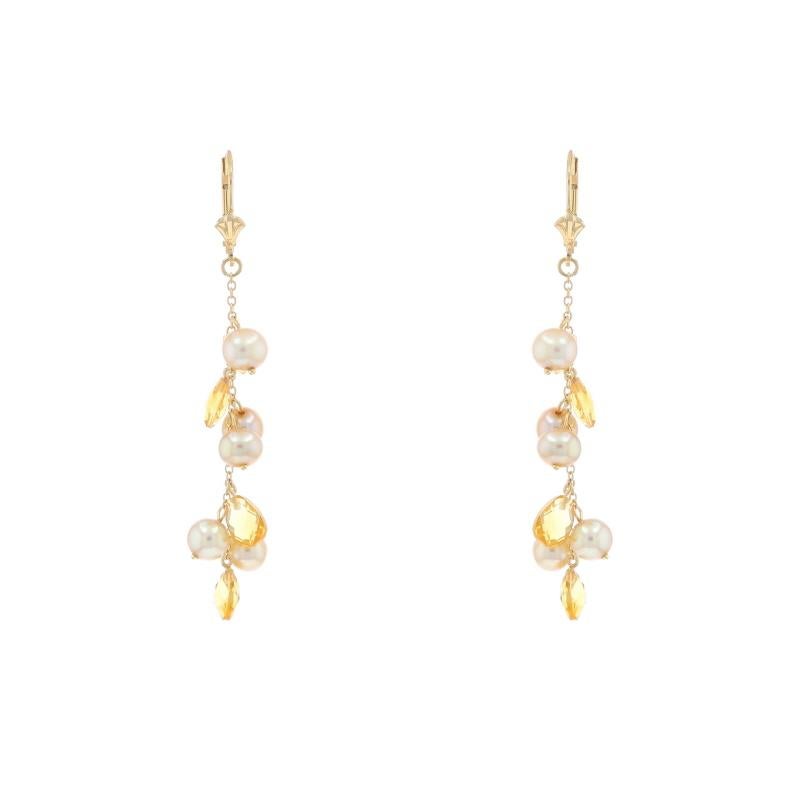 Metal Content: 14k Yellow Gold

Stone Information

Cultured Pearls
Color: Cream

Natural Citrines
Treatment: Heating
Cut: Briolette
Color: Yellow

Style: Dangle
Fastening Type: Leverback Closures

Measurements

Tall: 2 13/32