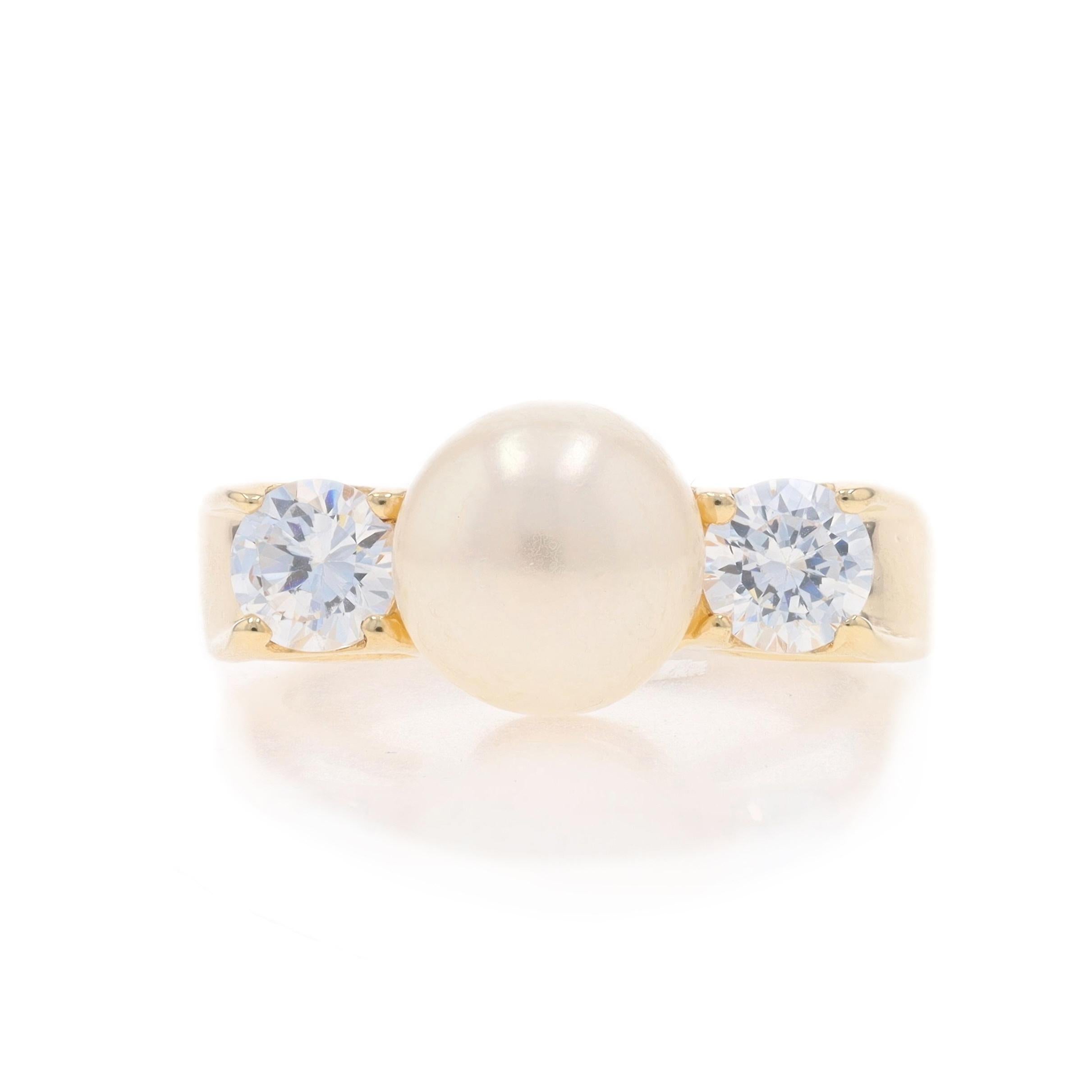 Size: 7
Sizing Fee: Up 1/2 a size for $30 or Down 1/2 a size for $30

Metal Content: 14k Yellow Gold

Stone Information

Cultured Pearl
Size: 9mm

Cubic Zirconias
Carat(s): 1.00ctw dew
Cut: Round Brilliant
Color: Clear

Total Carats: 1.00ctw

Style: