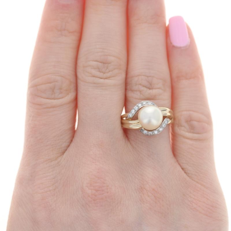 Size: 8 1/4
Sizing Fee: Down 3 for $30 or up 2 for $35

Metal Content: 14k Yellow Gold & 14k White Gold

Stone Information
Cultured Pearl
Diameter: 8.7mm

Natural Diamonds
Total Carats: .18ctw
Cut: Round Brilliant
Color: G - H
Clarity: SI2 -