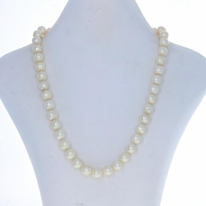 Metal Content: 18k Yellow Gold & 18k White Gold

Stone Information
Cultured Pearls

Natural Diamonds
Total Carats: 1.00ctw
Cut: Round Brilliant
Color: F - G
Clarity: VS1 - VS2

Necklace Style: Knotted Strand
Fastening Type: Invisible Screw-On