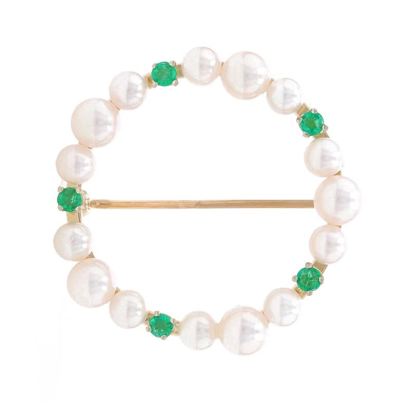 Metal Content: 14k Yellow Gold

Stone Information

Cultured Pearls
Size: 3.5mm - 4.4mm

Natural Emeralds
Treatment: Oiling
Carat(s): .25ctw
Cut: Round
Color: Green

Total Carats: .25ctw

Style: Brooch
Fastening Type: Hinged Pin and Whale Tail Bullet
