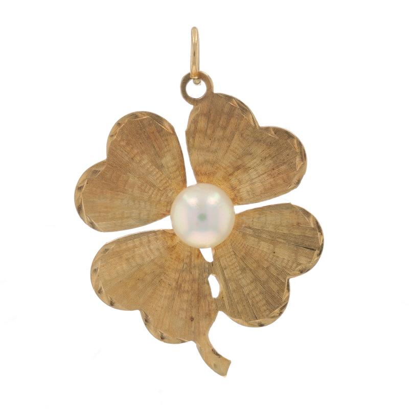 Metallgehalt: 14k Gelbgold

Informationen zu Stein

Zuchtperle
Farbe: Creme
Größe: 6,7 mm

Stil: Solitär
Thema: Vierblättriges Kleeblatt, Glückskleeblatt
Merkmale: Strukturierte Detaillierung

Messungen

Höhe (ab stationärem Bügel): 1 9/32