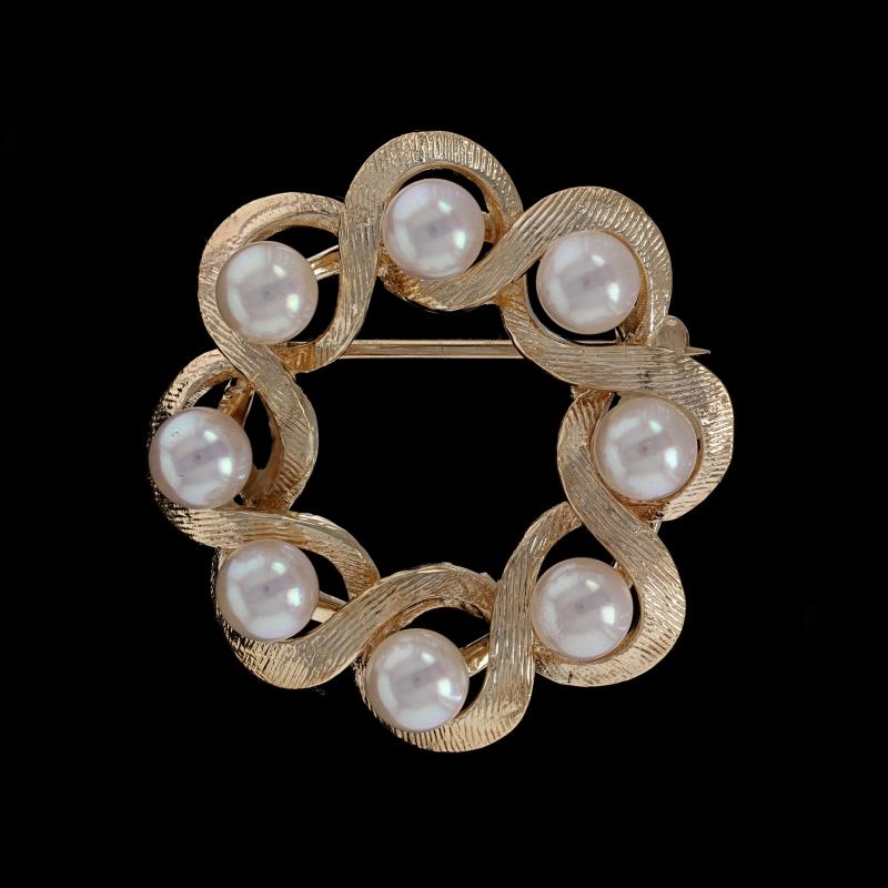 Metal Content: 14k Yellow Gold

Stone Information
Cultured Pearls
Diameters: 4.3mm - 4.4mm

Style: Brooch
Fastening Type: Hinged Pin and Whale Tail Clasp
Theme: Halo Twist Wreath
Features: Smooth & Brushed Finishes

Measurements
Tall: 1 1/16