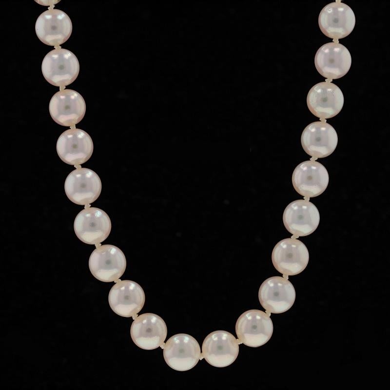 Retail Price: $2500

Metal Content: 14k Yellow Gold

Stone Information
Cultured Pearls
Color: White
Size: 6.5mm - 7.0mm

Style: Knotted Strand
Fastening Type: Tab Box Clasp with Side Safety Clasp
Features: Milgrain Filigree-Accented