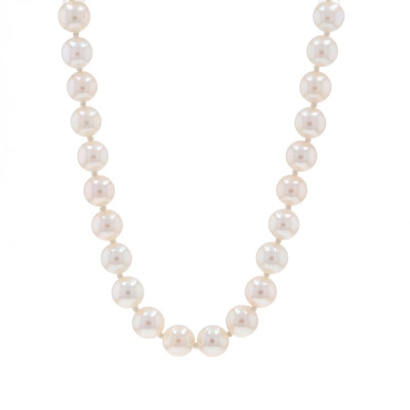 Metal Content: 14k Yellow Gold

Stone Information

Cultured Pearls
Size: 6mm - 6.5mm

Style: Knotted Strand
Fastening Type: Tab Box Clasp with Safety Bar
Features: Ribbed Clasp Detailing

Measurements

Length: 18