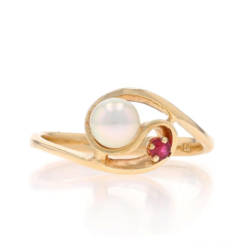 Size: 6 1/4
Sizing Fee: Up 3 sizes for $35 or Down 2 sizes for $35

Metal Content: 14k Yellow Gold

Stone Information

Cultured Pearl
Size: 4.9mm

Natural Ruby
Treatment: Heating
Carat(s): .06ct
Cut: Round
Color: Red

Style: Solitaire with Accent