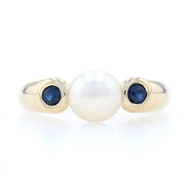 Size: 6
Sizing Fee: Down 2 for $30 or up 2 for $35

Metal Content: 14k Yellow Gold

Stone Information
Cultured Pearl
Size: 6.8mm

Genuine Sapphires
Treatment: Heating
Total Carat(s): .22ctw
Cut: Round 
Color: Blue

Style: Solitaire with