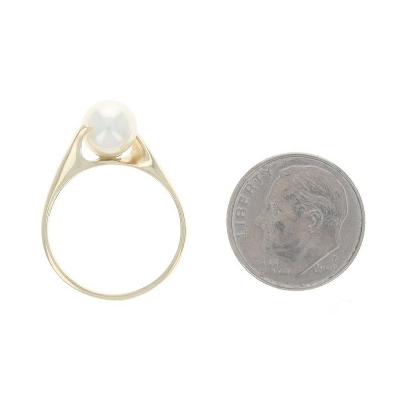Bague bypass solitaire en or jaune et perles de culture - 10 carats en vente 1