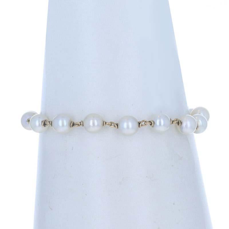 Époque : Vintage

Contenu du métal : Or jaune 14k

Informations sur les pierres

Perles de culture
Couleur : blanc
Taille : 6,4 mm-7,0 mm

Style : Lien
Type de fermeture : Fermoir à crochet

Mesures

Longueur : 7 1/4