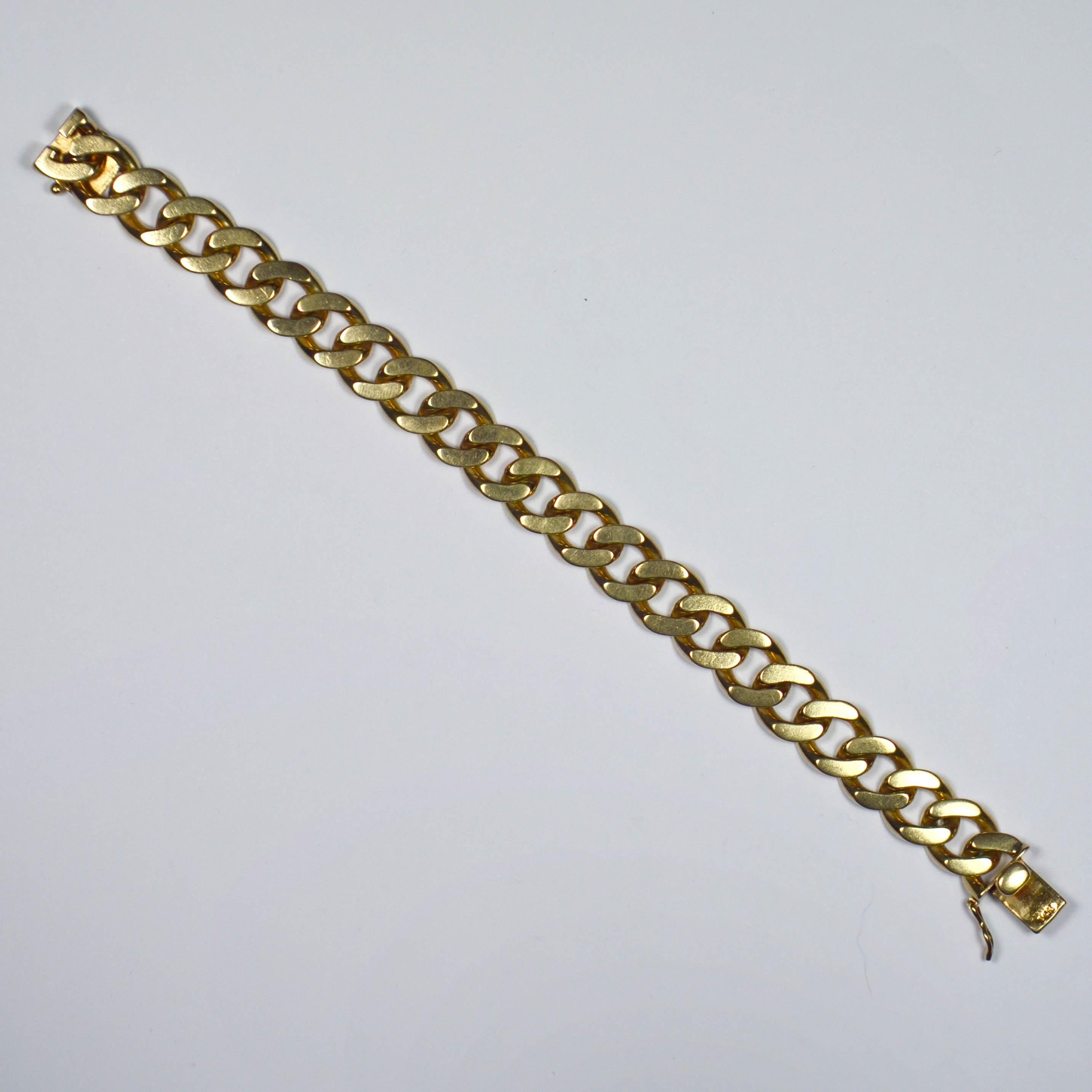 A heavy 14 karat yellow gold curb link chain bracelet. Marked 14K to the box clasp for 14 karat gold and American manufacture.

Dimensions: 18 x 1.1 cm
Weight: 47.75 grams