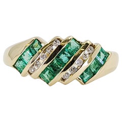Retro Yellow Gold Curved Emerald and Diamond Channel Band
