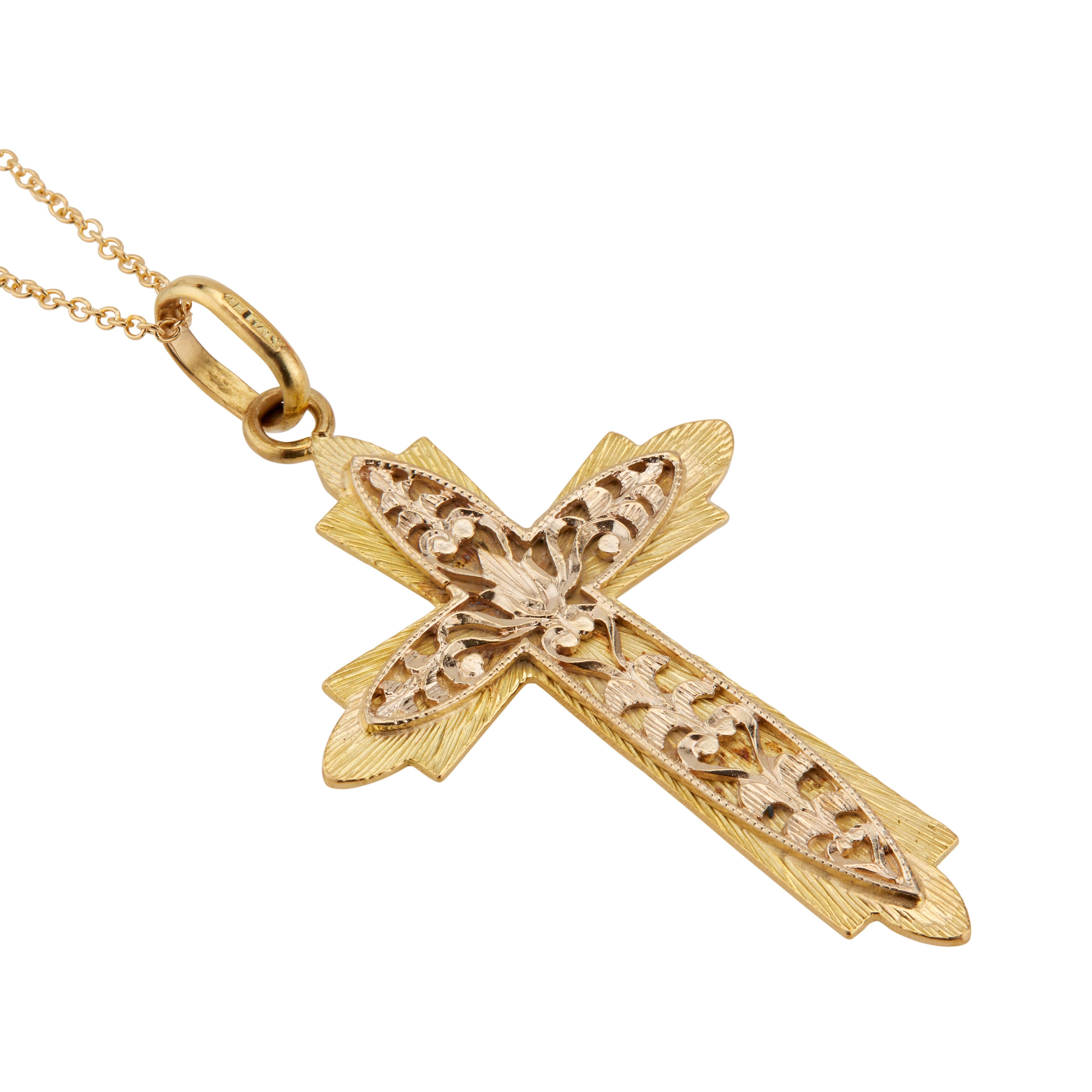 1960's 18k yellow gold custom made cross and chain. The cross is made of two separate pieces with the pierced top section soldered to the textured bottom. Can be worn with either side out. 18 inches. 

18k yellow gold 
Stamped: 18k
8.6 grams 
Top to