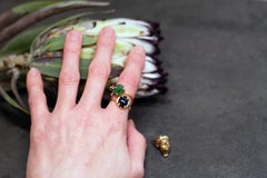 Bague jonquille en or jaune avec émeraude naturelle de taille ovale et diamant