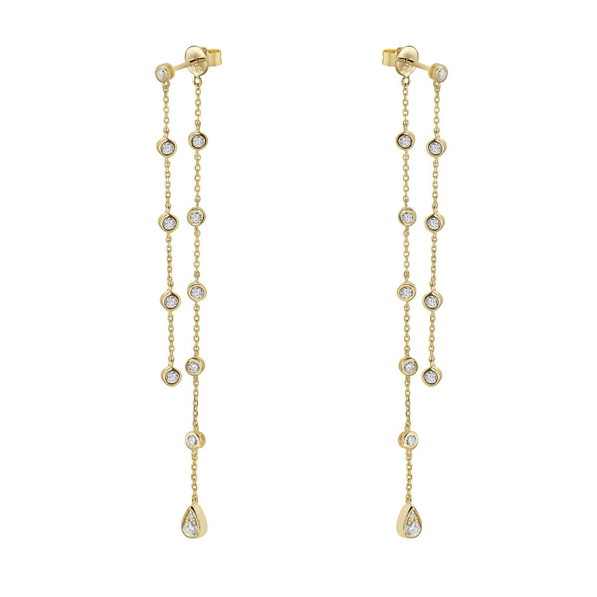 With these exquisite diamond dangle earrings, style and glamour are in the spotlight. These yellow gold dangle diamond by-the-yard earrings are set in 14-karat gold and made from 2.4 grams of gold. The color of the diamonds is GH. The clarity is