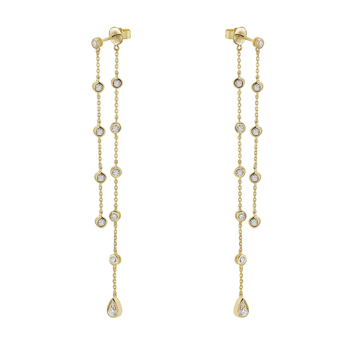 With these exquisite diamond dangle earrings, style and glamour are in the spotlight. These yellow gold dangle diamond by-the-yard earrings are set in 14-karat gold and made from 2.4 grams of gold. The color of the diamonds is GH. The clarity is